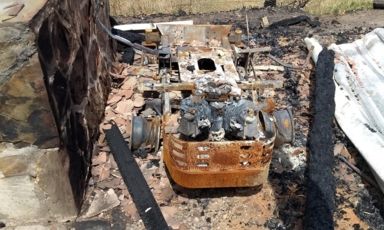 bushfire impact burnt out lawnmover