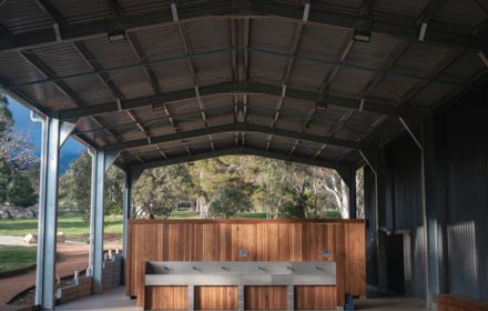 A stage with a wooden wall