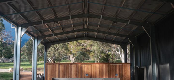 A stage with a wooden wall