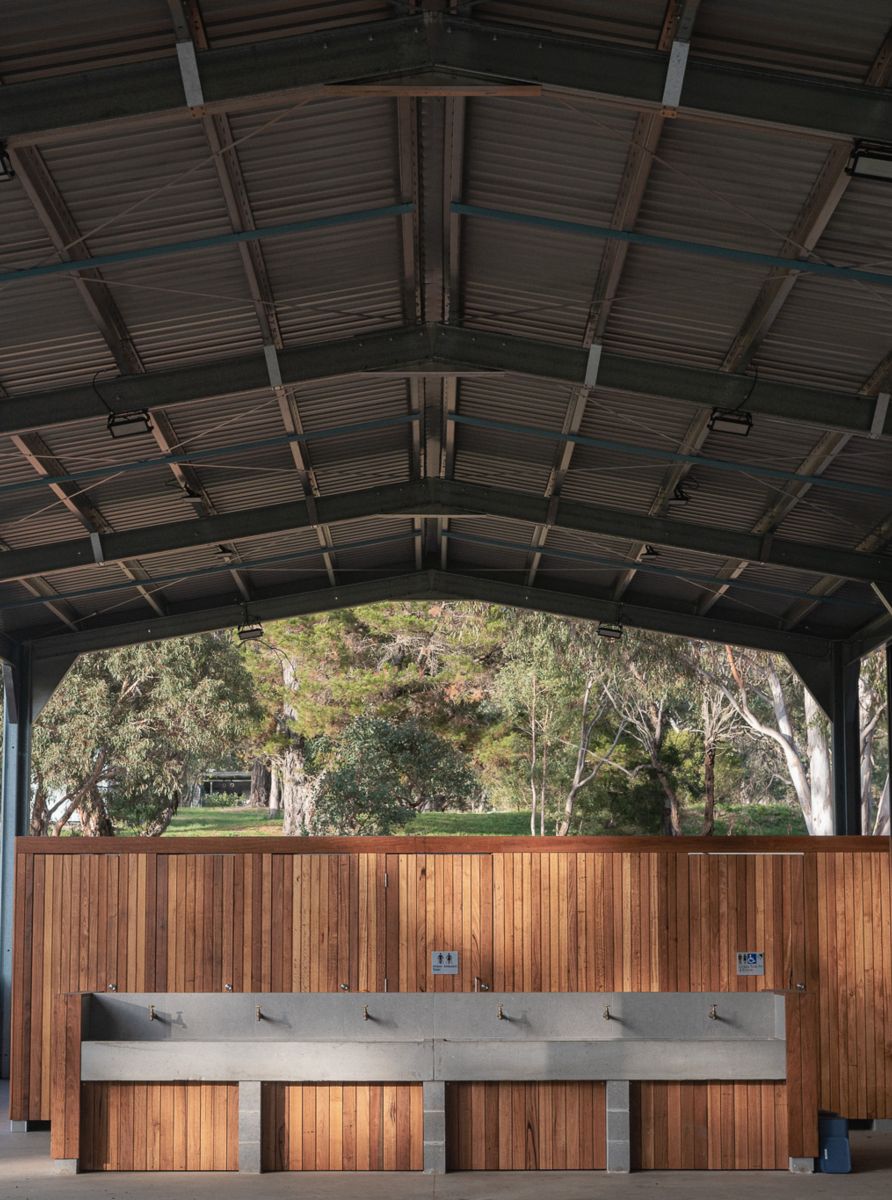 A stage with a wooden wall