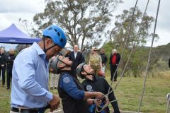 Ben Farinazzo, Margot Hurrell and and Mrs Hurley abseiling at Outward Bound Australia