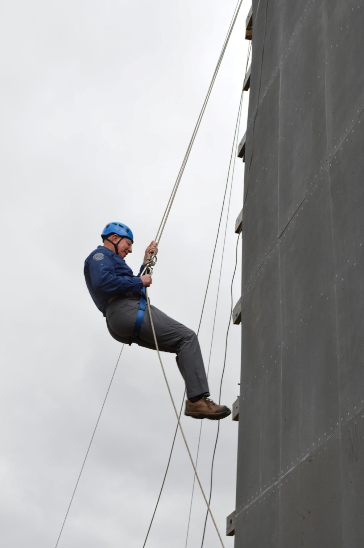 His Excellency The Governor General of Australia abseiling down a 10m tower at Outward Bound Australia.